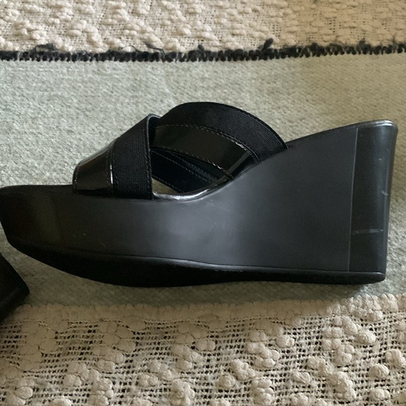 Black pair of platforms. Never worn!!!!! Paid 30 dollars for them. - Picture 6 of 8